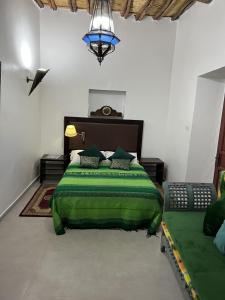 Letto o letti in una camera di Riad Le Lieu