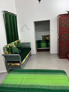 Letto o letti in una camera di Riad Le Lieu