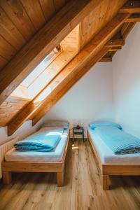 Postel nebo postele na pokoji v ubytování Apartmán Na Hradbách