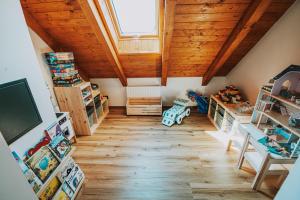 TV a/nebo společenská místnost v ubytování Apartmán Na Hradbách