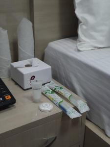 Charikot Downtown Hotel客房内的一张或多张床位