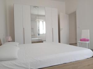 Letto o letti in una camera di Alghero Experience