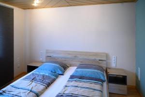 Postel nebo postele na pokoji v ubytování Ferienwohnung Kraus