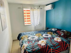 Postel nebo postele na pokoji v ubytování Appartement T3 au Moufia, Saint-Denis