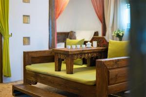 Big Tree Guesthouse - Naxi old style的休息区