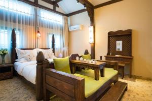 Big Tree Guesthouse - Naxi old style客房内的一张或多张床位