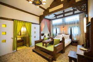 Big Tree Guesthouse - Naxi old style客房内的一张或多张床位
