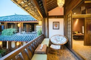 Big Tree Guesthouse - Naxi old style的休息区
