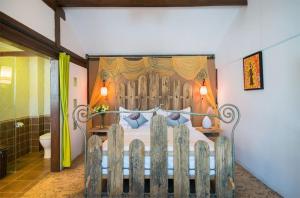 Big Tree Guesthouse - Naxi old style客房内的一张或多张床位