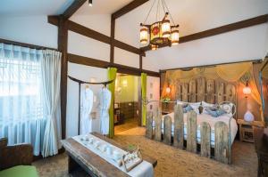 Big Tree Guesthouse - Naxi old style客房内的一张或多张床位