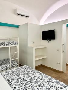 TV a/nebo společenská místnost v ubytování Costantino Home