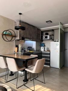 Kuchyň nebo kuchyňský kout v ubytování Fantástico LOFT EN LA COSTANERA