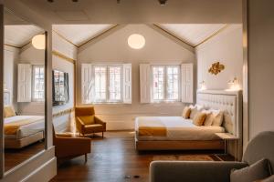 Uma área de estar em EMAJ Boutique Hotel