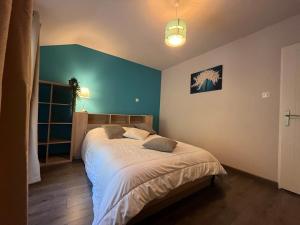 Rúm í herbergi á Maison vue exceptionnelle