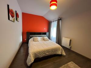 Rúm í herbergi á Maison vue exceptionnelle