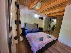 Postel nebo postele na pokoji v ubytování casa tip duplex