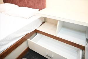 Postel nebo postele na pokoji v ubytování Hotel Royal Radiant