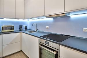 Nhà bếp/bếp nhỏ tại Vela Bianca Home Garda +12 ảnh