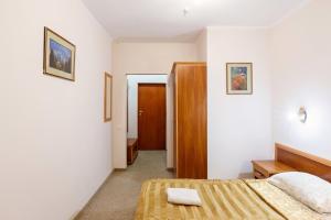 Posteľ alebo postele v izbe v ubytovaní GORGANY resort & SPA