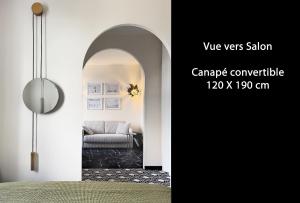 Voodi või voodid majutusasutuse Les Alcoves - Studios design toas