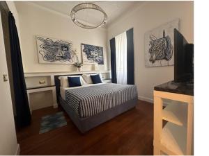 Postel nebo postele na pokoji v ubytování Maison d'Or