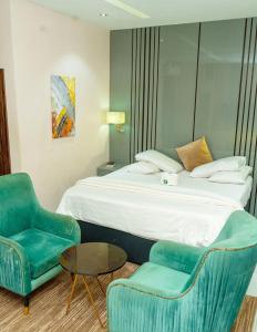 Postel nebo postele na pokoji v ubytování Wesley Hotels