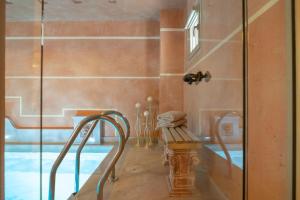 Bilik mandi di Unique room with indoor pool & attic