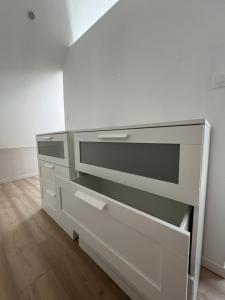 Postel nebo postele na pokoji v ubytování L antre du stade