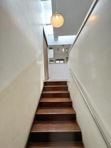 a staircase in a building with a light at Ananya Apartments Phase 1 in Kathmandu