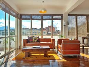 a living room with a couch and a table at Ananya Apartments Phase 1 in Kathmandu