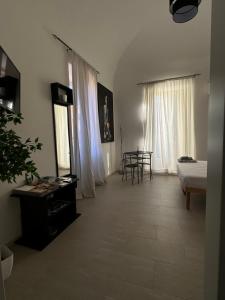 TV a/nebo společenská místnost v ubytování B&B La Meta