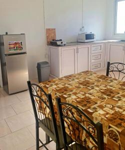Kuchyň nebo kuchyňský kout v ubytování OneLove Apartment-La Gaulette