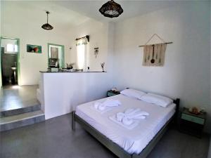 Posteľ alebo postele v izbe v ubytovaní Fragos Apartments