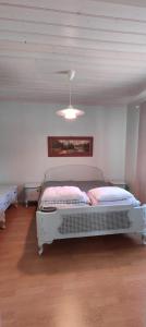Postel nebo postele na pokoji v ubytování Nicolas apartment