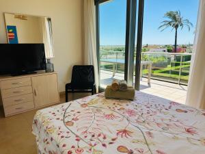 Μια τηλεόραση ή/και κέντρο ψυχαγωγίας στο Apartamento ideal para desconectar