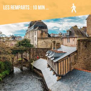 a poster of a city with a bridge and a river at Studio Centre Historique in Vannes