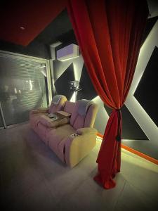 Χώρος καθιστικού στο L unique Cinéma Room