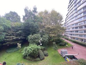 an aerial view of a building with a garden at Jardin Cambronne Tour Eiffel in Paris