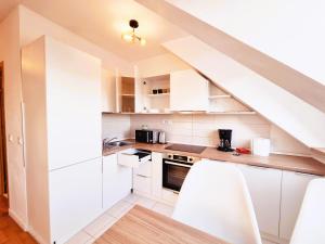 Kuchyň nebo kuchyňský kout v ubytování Bucharest Central E Apartment + 11 fotografií