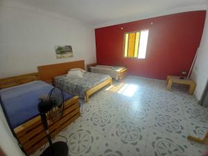 Postel nebo postele na pokoji v ubytování Casa Mario