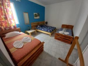 Postel nebo postele na pokoji v ubytování Casa Mario