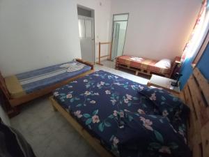 Postel nebo postele na pokoji v ubytování Casa Mario