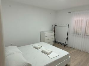 Postel nebo postele na pokoji v ubytování Guest house Ivan