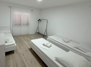 Postel nebo postele na pokoji v ubytování Guest house Ivan