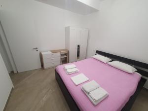 Postel nebo postele na pokoji v ubytování L'Acquaviva