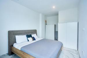 Ένα ή περισσότερα κρεβάτια σε δωμάτιο στο 233 Boulevard - Luxury Apartments +33 φωτογραφίες