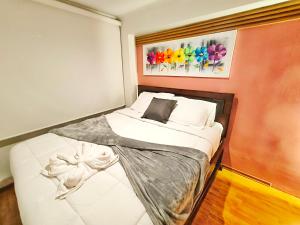Postel nebo postele na pokoji v ubytování Udla Apartamento para 6 personas frente al Mall Riocentro