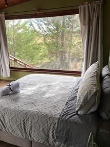 Postel nebo postele na pokoji v ubytování Glamping La Reserva
