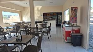 Condomínio Farol das Dunas餐厅或其他用餐的地方