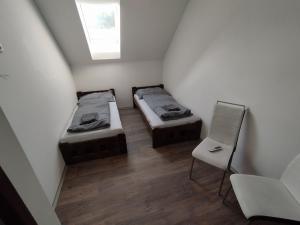 Postel nebo postele na pokoji v ubytování Penzion - sklipek Otáhalovo